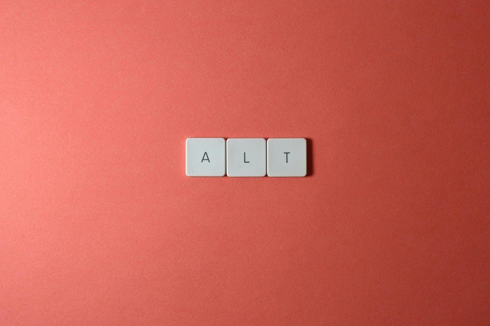 Fond rouge avec 3 lettres A L T dans un style touche de clavier